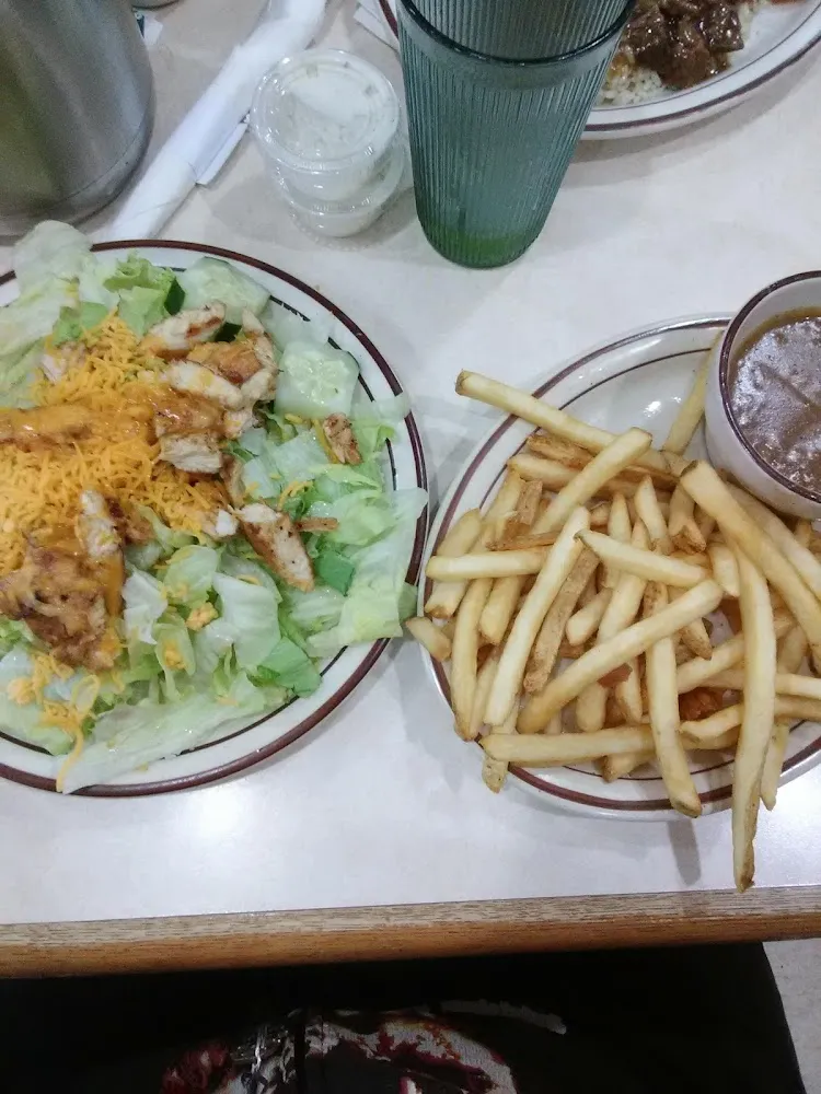 Grilled Chicken Salad and French Fries with Gravy